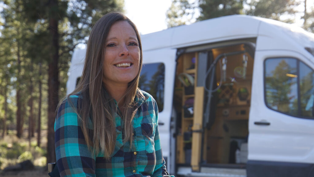 Lisa Franks in front of her custom-built camper van.